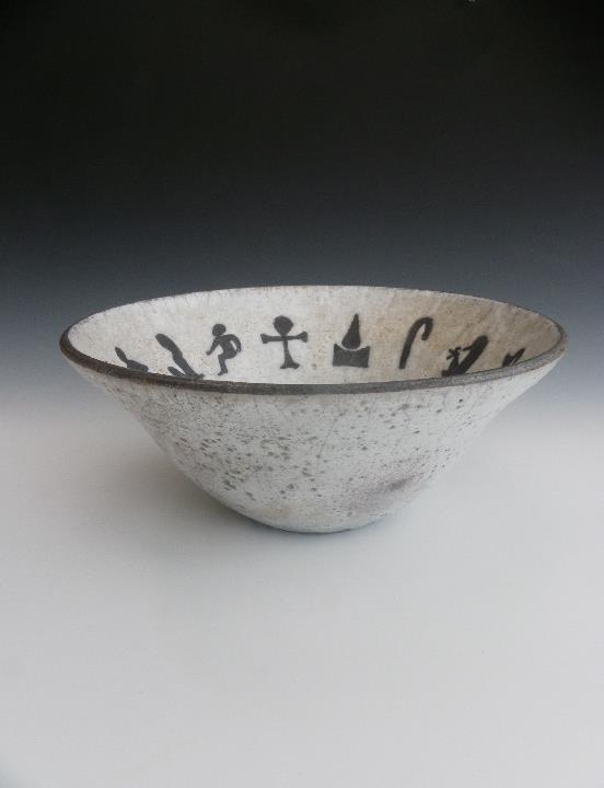Raku-fired pot.
Hieroglyphic images inspired by life.
